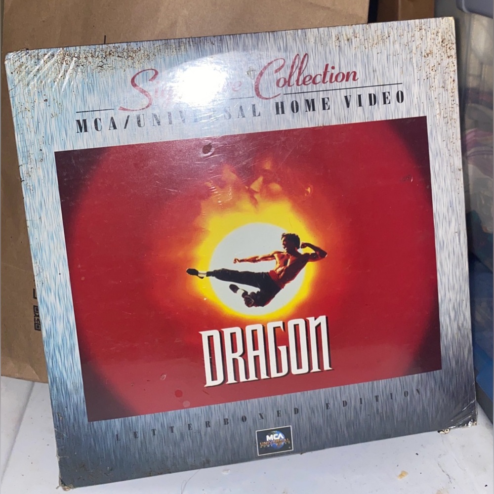 Buce lee brandon lee Dragon laserdisc. sealed new 
Has shop wear
#Dragon #Collec